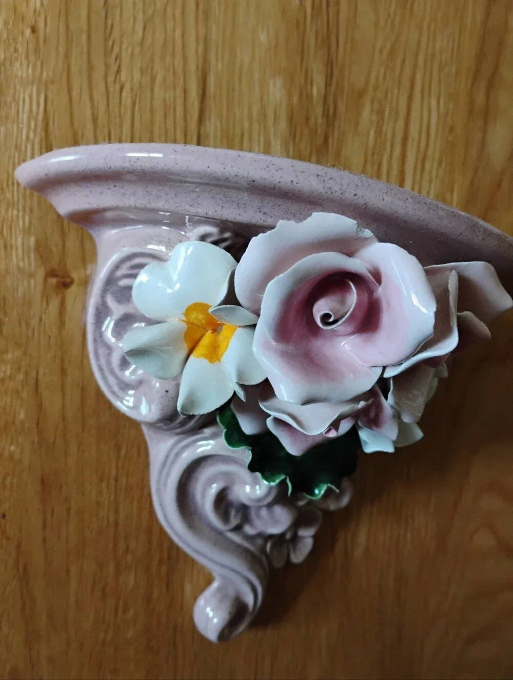 Pink Ceramic Wall Shelf with Floral Accent
